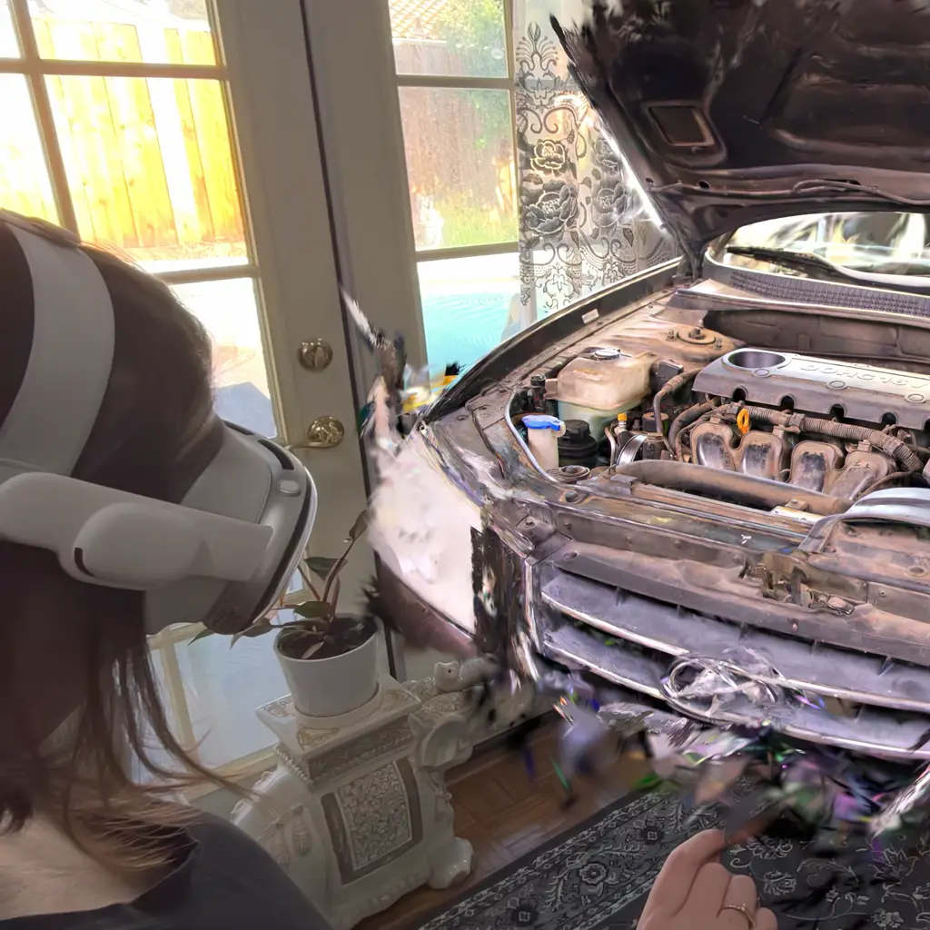 A 3d gaussian splat capture of an engine being viewed through the Apple Vision Pro in mixed reality